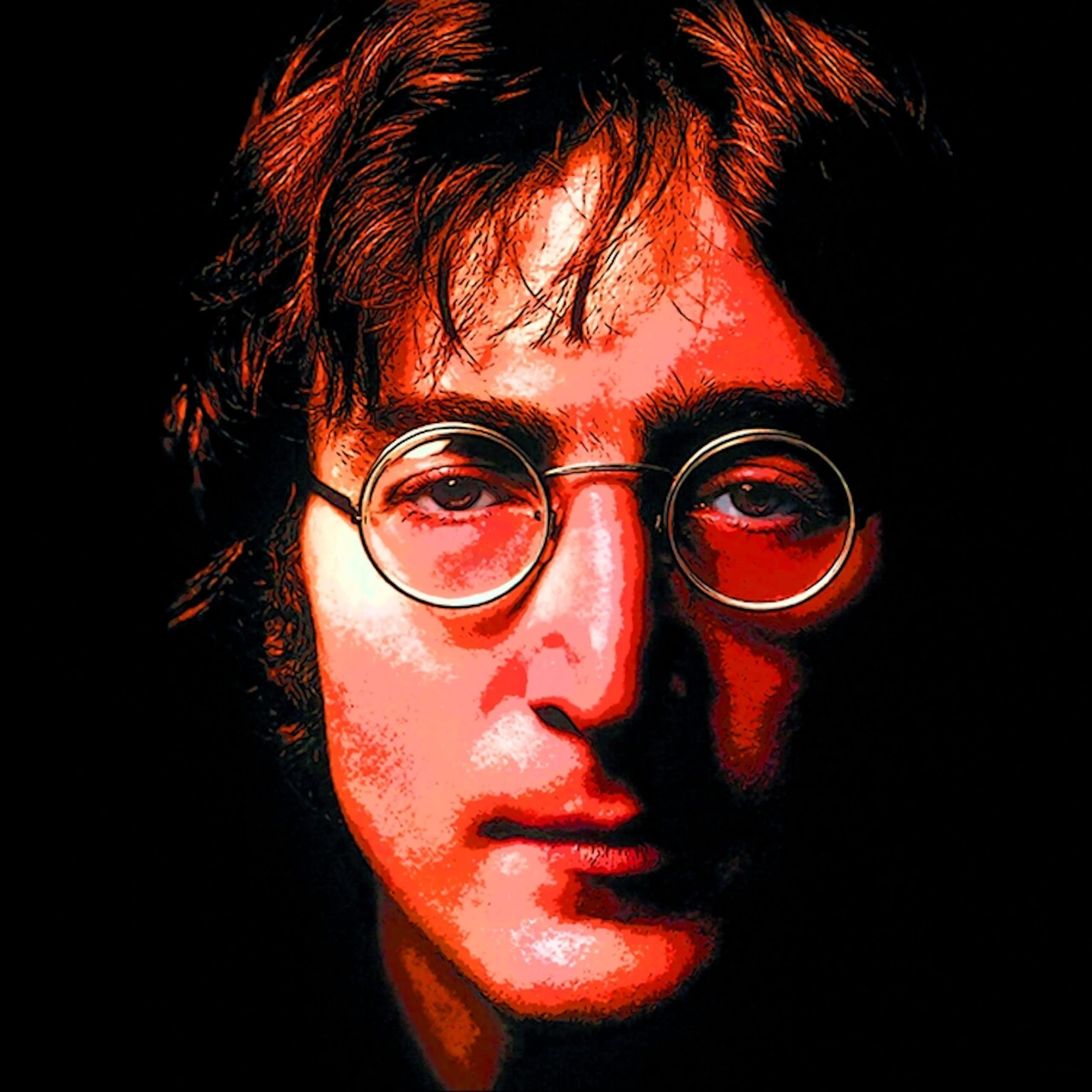 John Lennon with his signature round glasses