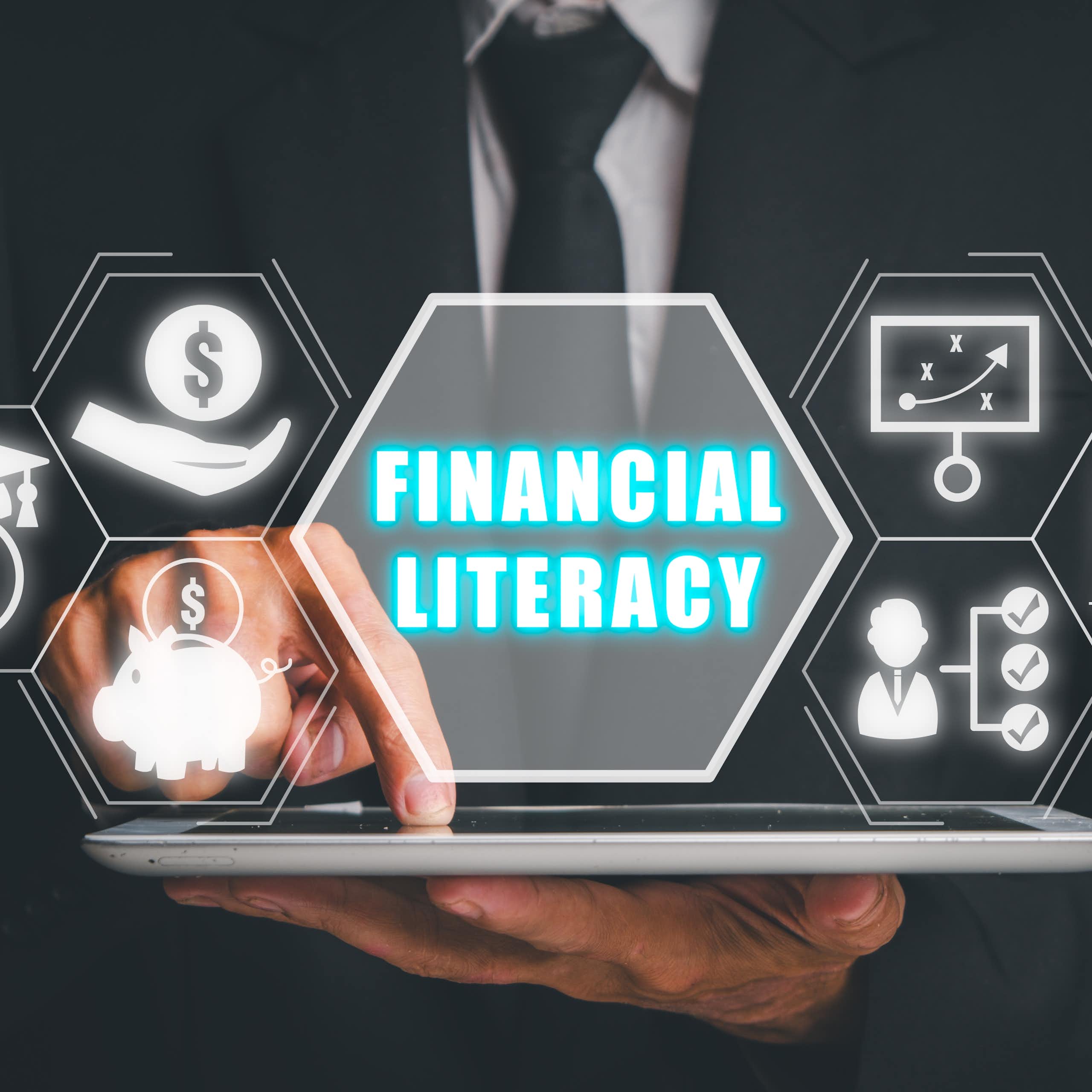 Graphic of a person in business short and tie, holding an electronic device, with money-related icons superimposed and the words 'financial literacy'