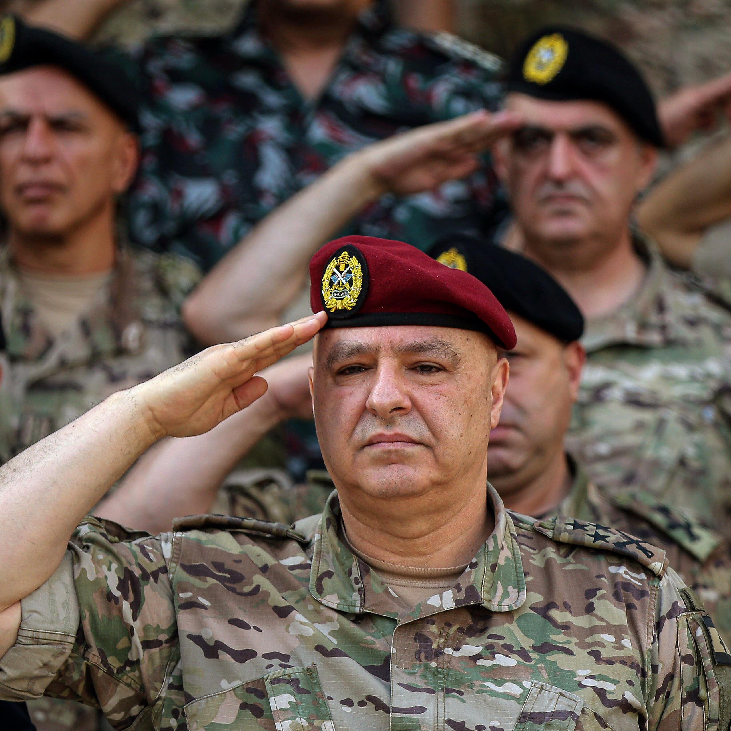 General Joseph Aoun (C), commander of the Lebanese armed forces, salutes