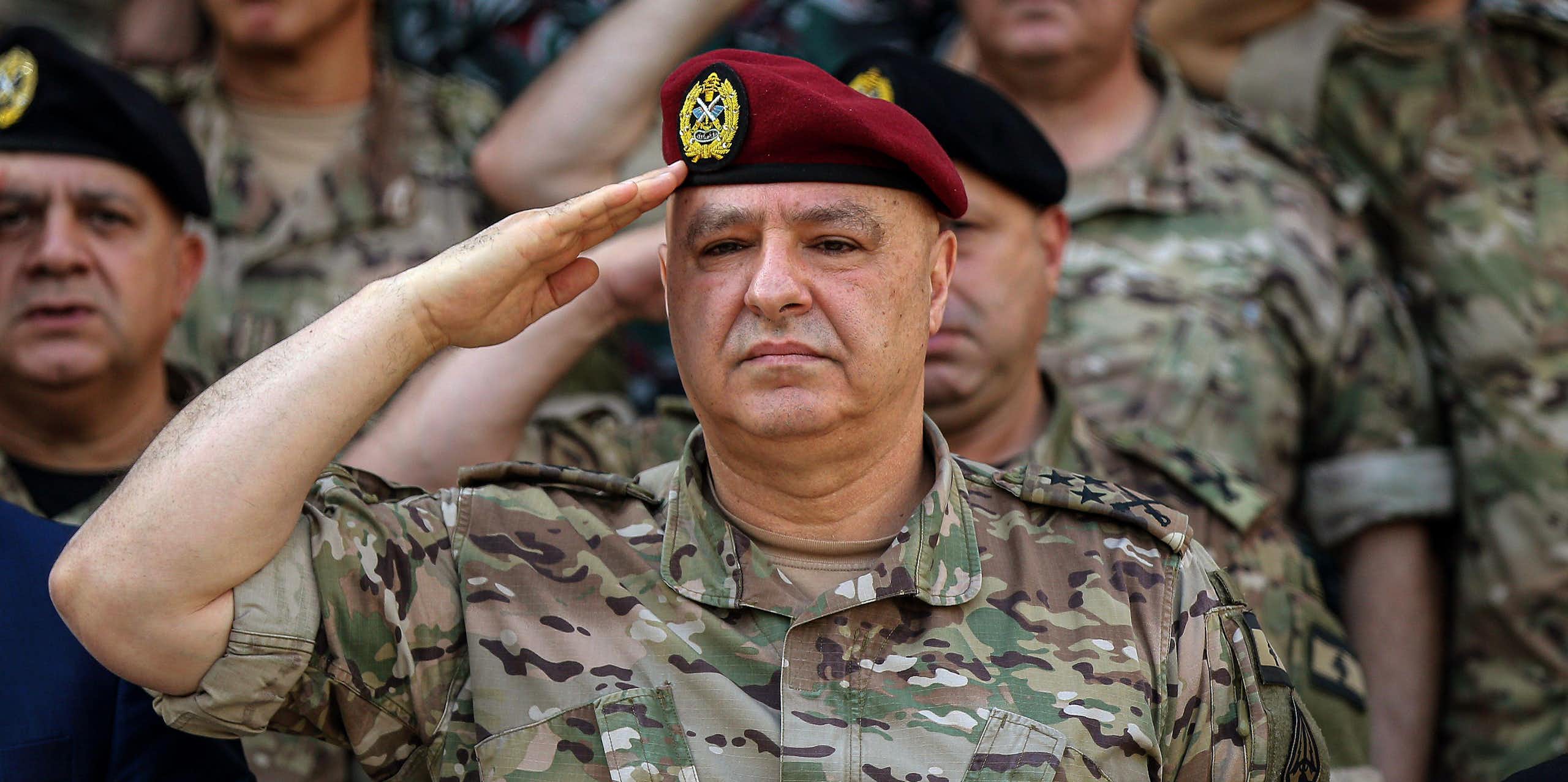 General Joseph Aoun (C), commander of the Lebanese armed forces, salutes
