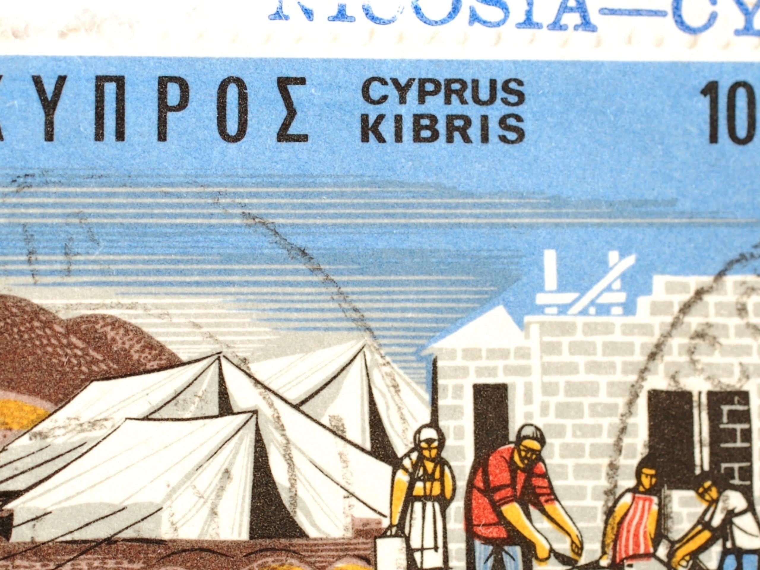 A 1976 stamp depicting a family of refugees in Cyprus